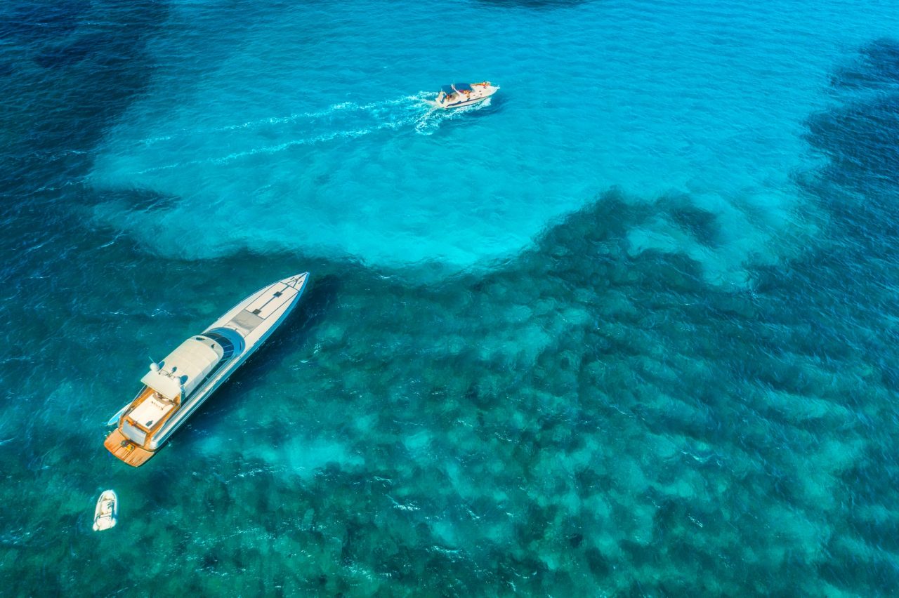 aerial-view-of-luxury-yachts-in-transparent-blue-sea